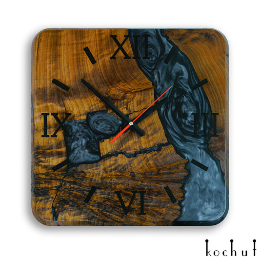 Quantum — Holz- und Epoxidharz-Wanduhr
